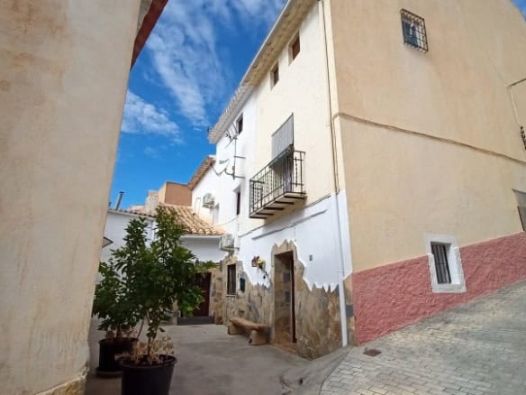 Charming village house in Hinojares, Jaen with traditional architecture and scenic surroundings.