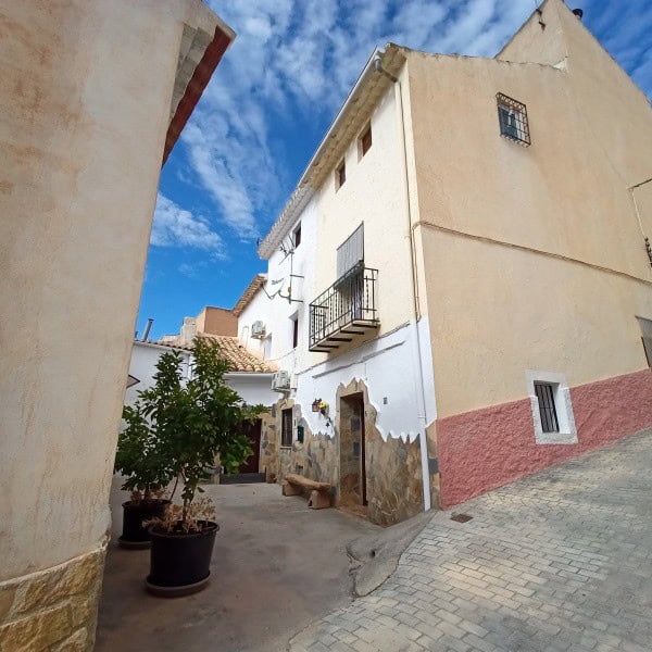 Charming village house in Hinojares, Jaen with traditional architecture and scenic surroundings.