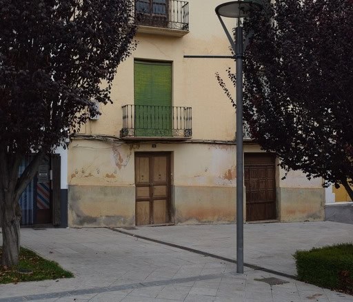 Town House for sale in Baza, Granada with traditional architecture and charming balconies.