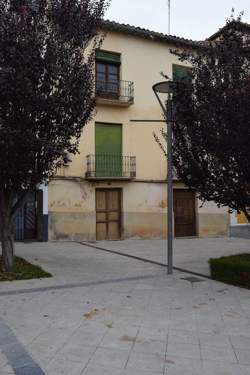 Town House for sale in Baza, Granada with traditional architecture and charming balconies.