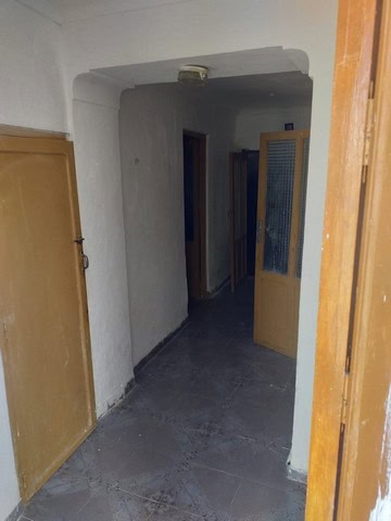 Village property interior with simple doors and white walls in Galera, Granada.