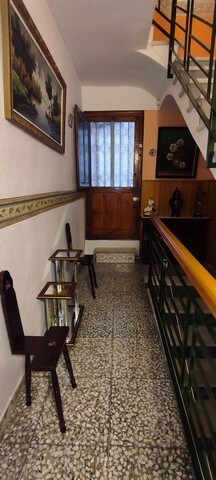 Charming town house in Tijola, Almeria, featuring a cozy interior with wooden accents and traditiona.