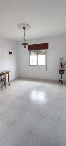 Interior view of a town house in Tijola, Almeria, featuring a bright, spacious room with a window, m.