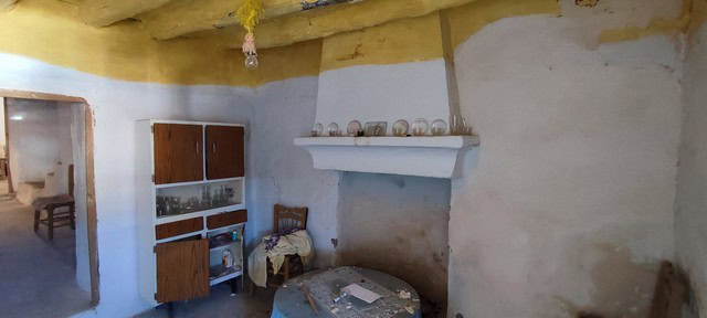 Interior view of a charming town house in Tijola, Almeria, showcasing rustic style and authentic cha.