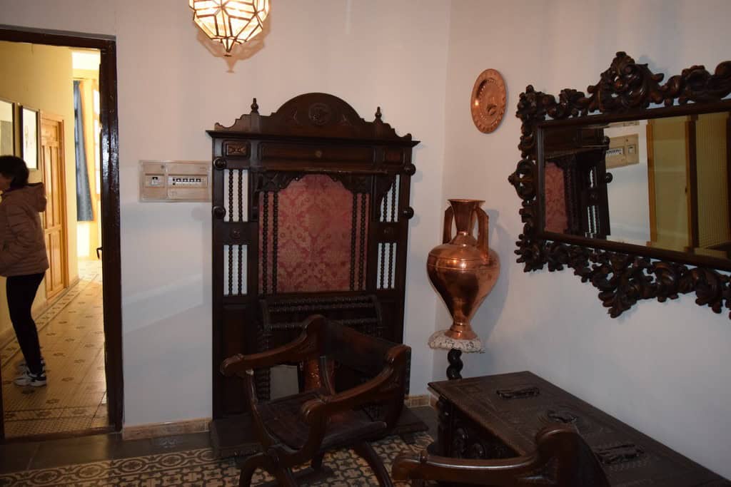 Charming interior of a traditional town house in Baza, Granada, featuring antique furniture and orna.