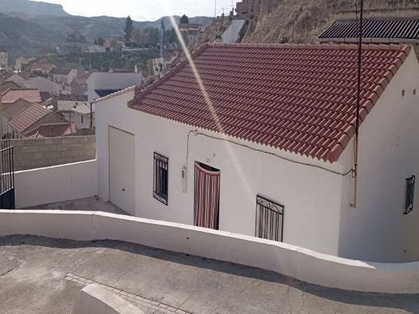 Charming village house with red-tiled roof in Villanueva de las To, Granada, ideal for a peaceful ru.
