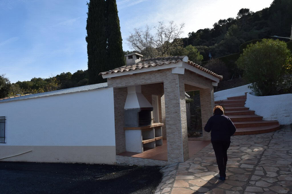 Charming outdoor barbecue area at a rural property in Pozo Alcon, Jaen, with scenic surroundings and.