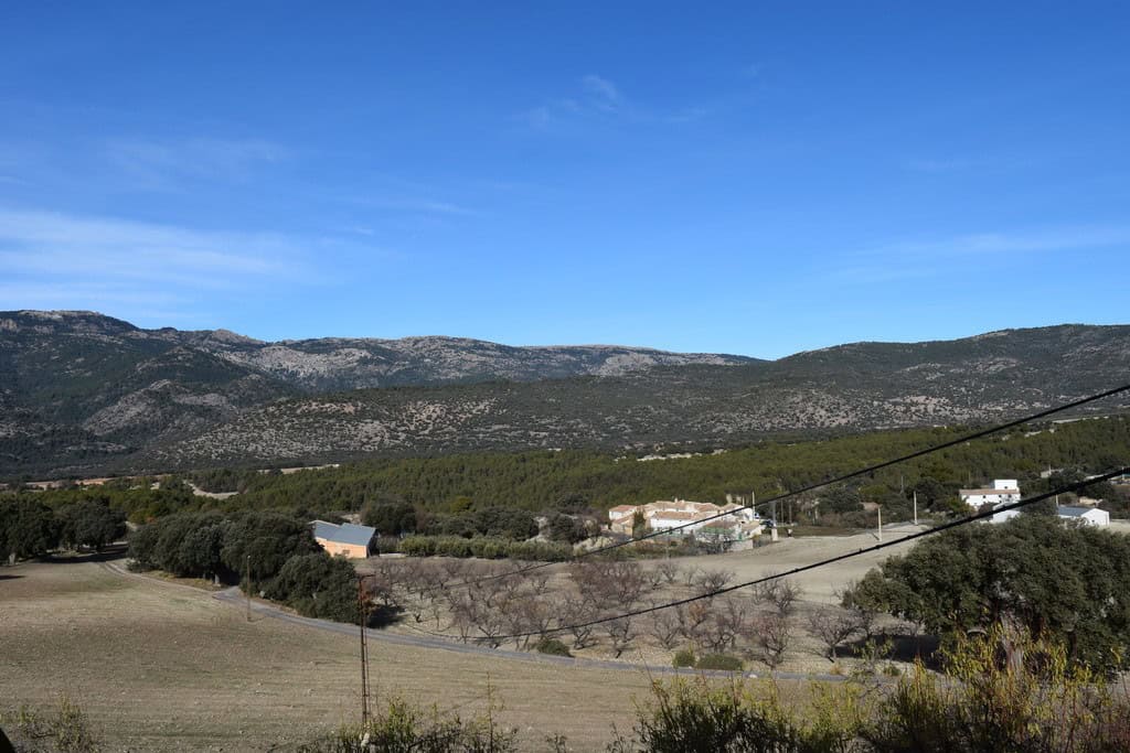 Scenic view of rural land and mountains in Pozo Alcon, Jaen, ideal for countryside living or investm.