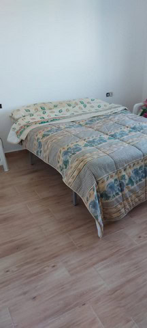 Charming bedroom in a villa located in Cantoria, Almeria, with a cozy bed and simple decor.