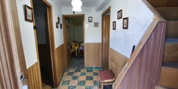 Charming village home interior in Fontanar, Jaen, featuring traditional decor and cozy living spaces.