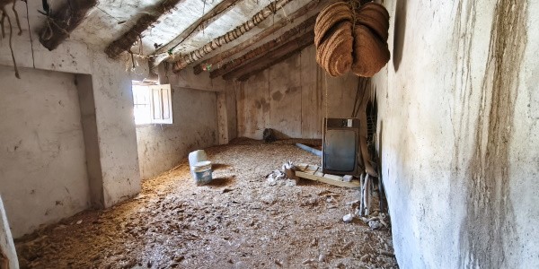 Charming rural village property in Fontanar, Jaen, with rustic interior and traditional architecture.