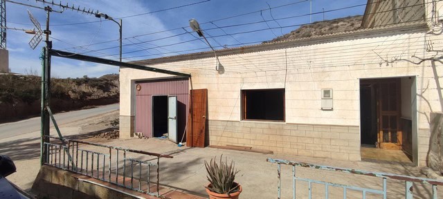 Charming rural property in Seron, Almeria, featuring a simple exterior with outdoor space and basic.
