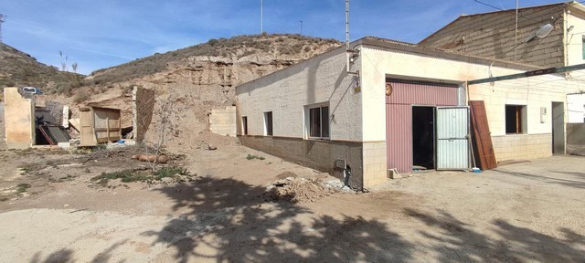 Rural property in Seron, Almeria, with land and building structures in a scenic countryside setting.
