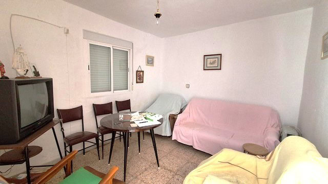 Charming rural home interior in Seron, Almeria with simple furnishings and cozy atmosphere.