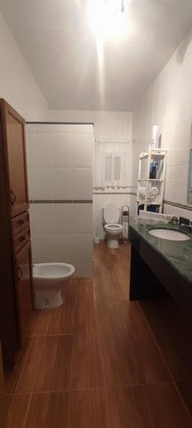 Charming rural property bathroom in Oria, Almeria with modern fixtures and rustic decor.