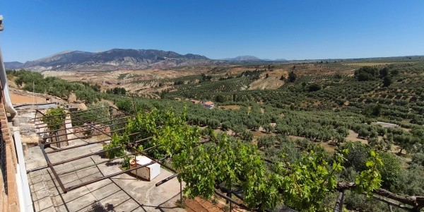 Village property in Fontanar, Jaen featuring lush greenery and mountain scenery, ideal for rural liv.