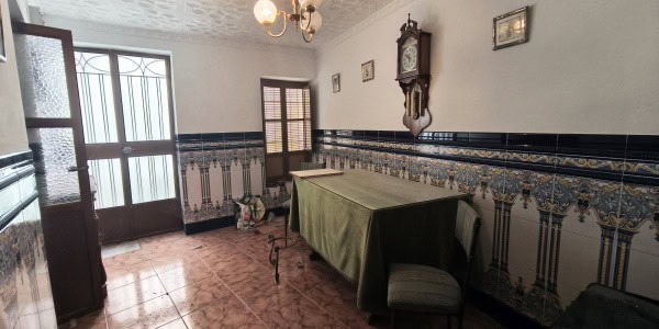 Charming interior of a rural property in Don Pedro, Jaen, featuring traditional decor and spacious r.