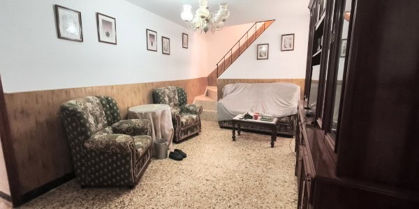 Charming rural home interior in Don Pedro, Jaen with cozy seating and traditional decor.