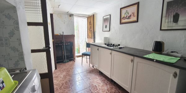 Interior view of a rural property in Don Pedro, Jaen, showcasing a simple kitchen area.