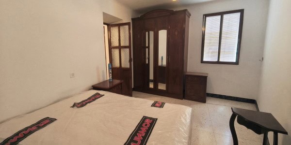 Rural property for sale in Don Pedro, Jaen, featuring traditional architecture and scenic surroundin.