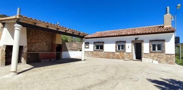 Rural property in Macael, Almeria with traditional architecture and spacious outdoor area.