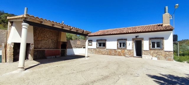 Rural property in Macael, Almeria with traditional architecture and spacious outdoor area.