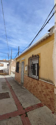 Charming village house in Purchena, Almeria, with traditional architecture and vibrant surroundings.