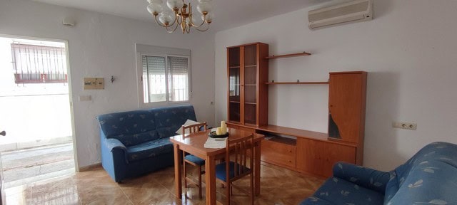 Charming village home in Purchena, Almeria with cozy living room and traditional decor.