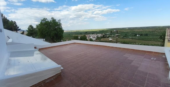 Village Property in Fontanar, Jaen with scenic views and traditional architecture.