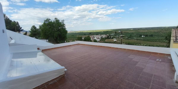Village Property in Fontanar, Jaen with scenic views and traditional architecture.