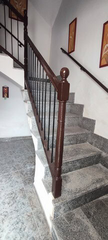 Charming village property staircase in Somontin, Almeria, with wooden handrails and stone steps.