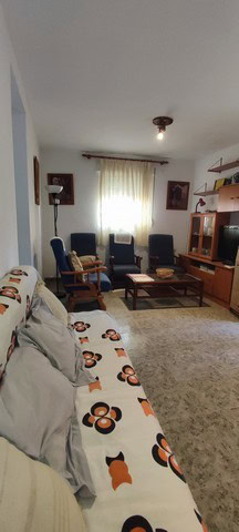 Charming village home in Somontin, Almeria with cozy living room and traditional decor.