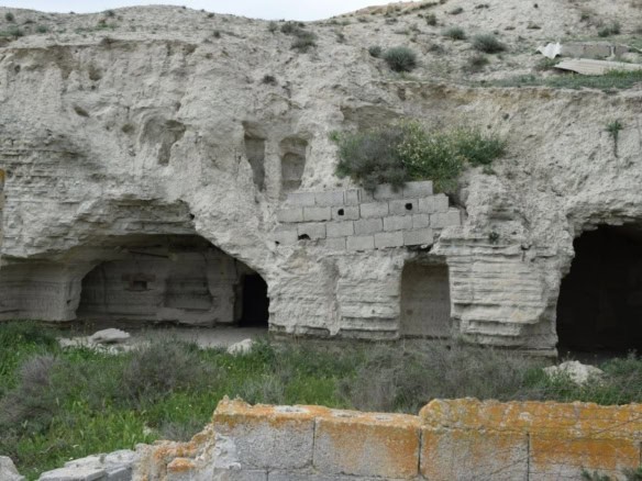 Cave house carved into the hillside in Benamaurel, Granada, offering unique living space in a scenic.