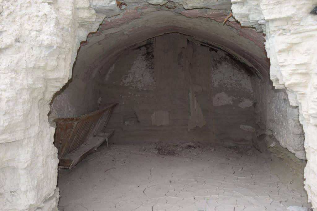 Cave house interior in Benamaurel, Granada, showcasing traditional underground living space.