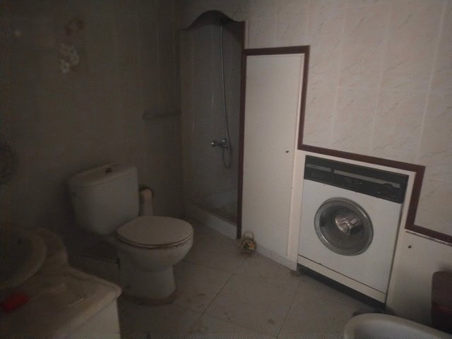 Cozy village home in Somontin, Almeria, featuring a bathroom and laundry area. Ideal for those seeki.
