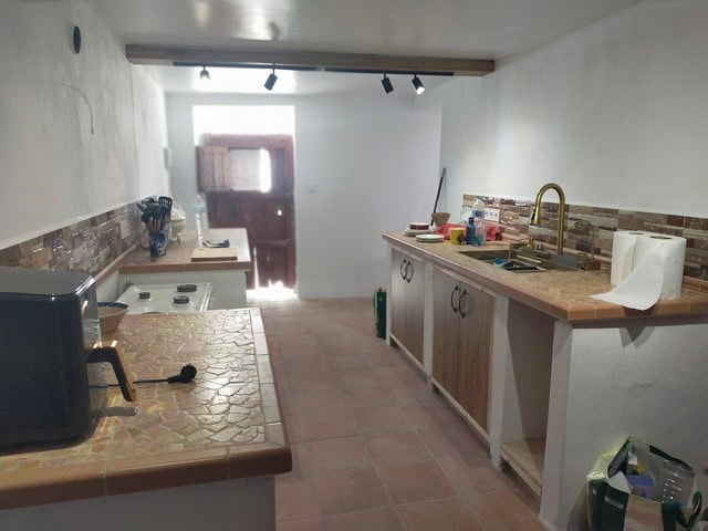 Charming village property in Urracal, Almeria, featuring a cozy kitchen with rustic tiles and modern.