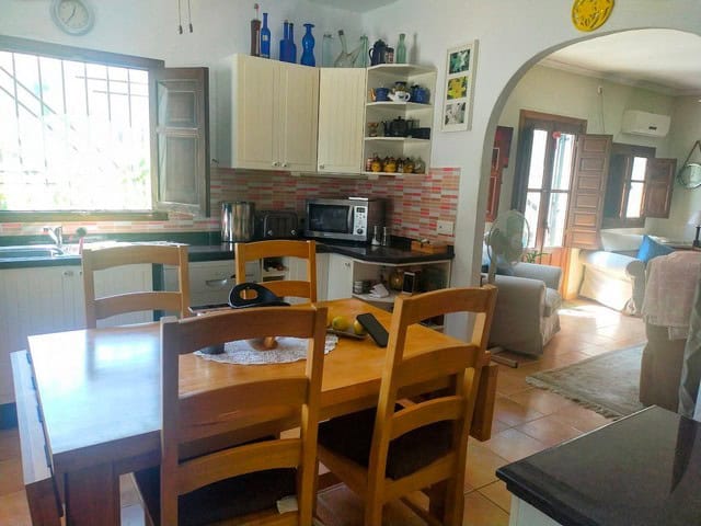 Cozy kitchen and dining area in a rural property located in Seron, Almeria. Perfect for peaceful liv.