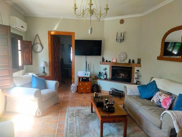 Cozy living room in a rural property located in Seron, Almeria, featuring traditional decor and mode.