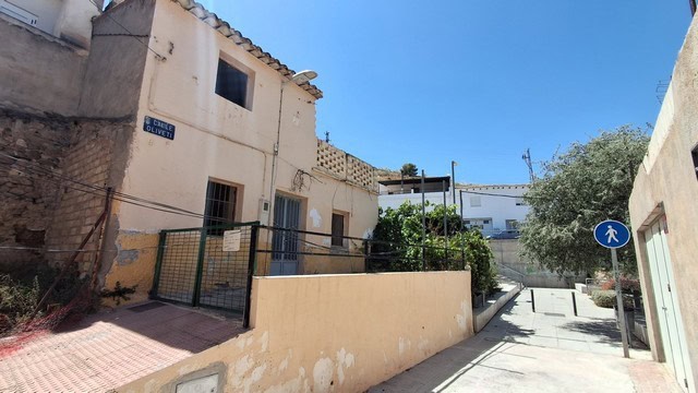 Charming town house in Tijola, Almeria, with traditional architecture and outdoor space. Perfect for.