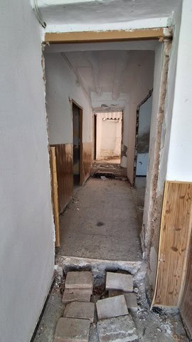 Interior view of a town house in Tijola, Almeria, showing renovation needs and rustic charm.