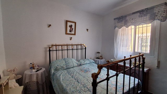 Beautiful bedroom in a village property in Somontin, Almeria, featuring traditional decor and natura.