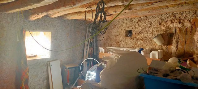 Traditional rural home interior in Seron, Almeria, with rustic walls and natural light.