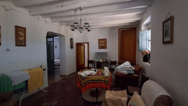 Cozy rural property interior in Tijola, Almeria with rustic furniture and natural light.