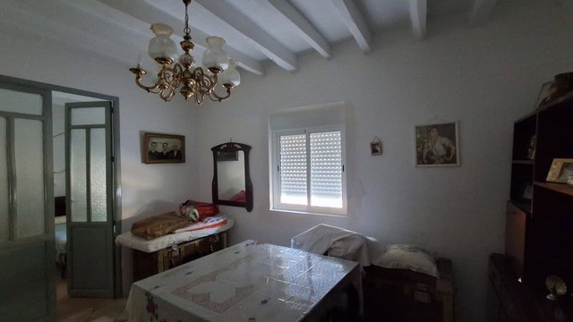Charming rural home interior in Tijola, Almeria, featuring traditional decor and cozy furnishings.