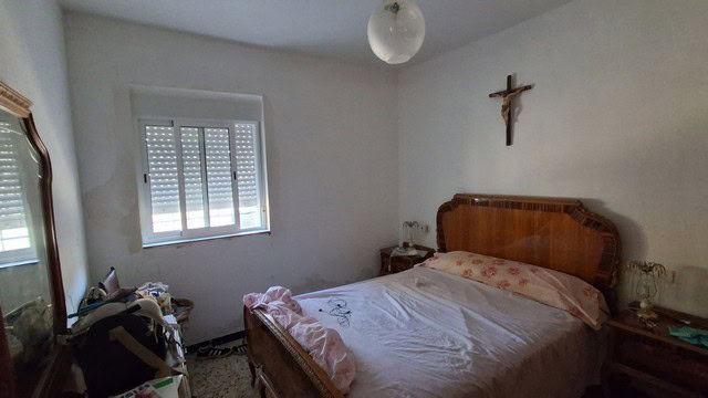 Beautiful bedroom in rural Tijola property, perfect for peaceful living in Almeria.