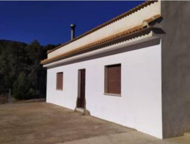 Rural property in Purchena, Almeria with white exterior walls and traditional tiled roof.