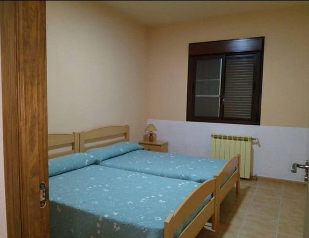 Charming bedroom in rural property located in Purchena, Almeria, with simple furnishings and a cozy.