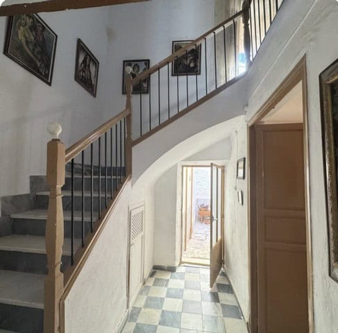 Interior view of a town house staircase in Purchena, Almeria, showcasing traditional Spanish archite.