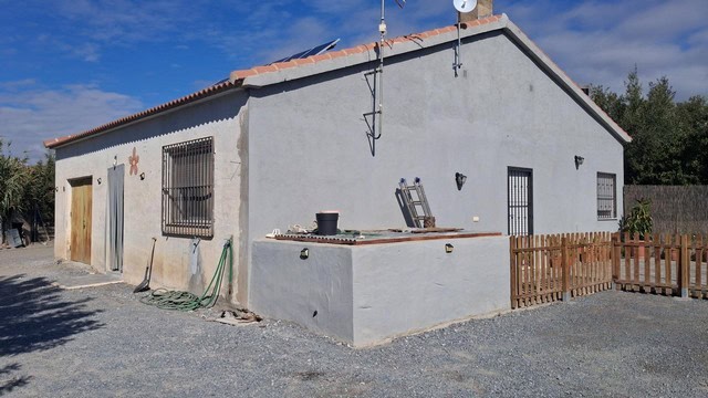 Charming villa in Armuna, Almeria featuring traditional architecture and a large outdoor space for r.