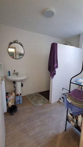 Interior view of a simple, functional bathroom in a villa in Armuna, Almeria.